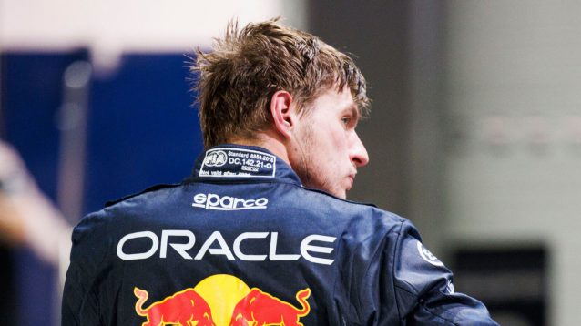 Max Verstappen with his back to the camera