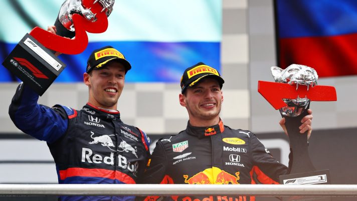 HOCKENHEIM, GERMANY - JULY 28: Race winner Max Verstappen of Netherlands and Red Bull Racing and third placed Daniil Kvyat of Russia and Scuderia Toro Rosso celebrate on the podium during the F1 Grand Prix of Germany at Hockenheimring on July 28, 2019 in Hockenheim, Germany. (Photo by Mark Thompson/Getty Images)