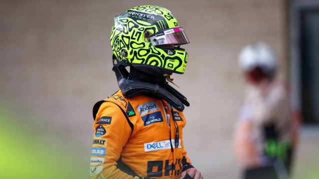 Lando Norris walks through parc ferme after sprint qualifying in Austin