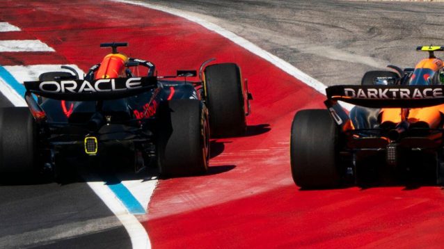 Max Verstappen runs Lando Norris wide