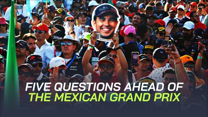 Sergio Perez's face is held up by a fan.