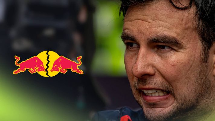 Sergio Perez bears his teeth as he pulls an anguished face with a cracked Red Bull logo alongside him