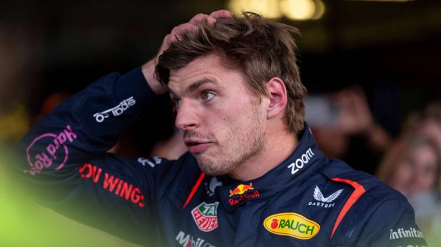 Max Verstappen scratches his head during conversation after qualifying in Mexico