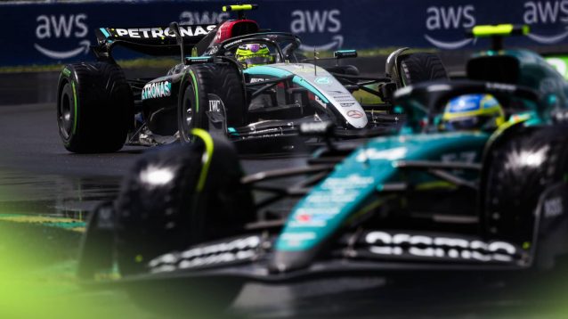 Frernando Alonso enters Turn 2 in Canada with Lewis Hamilton's Mercedes in hot pursuit