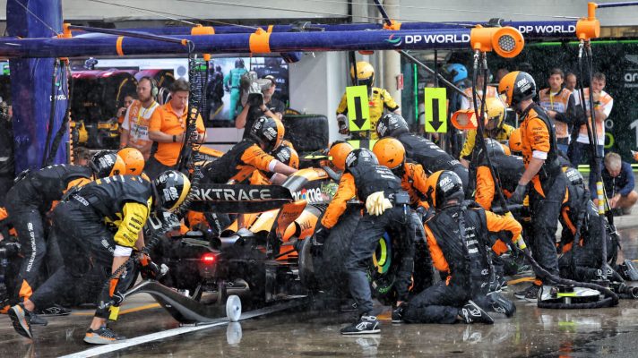 Lando Norris in for a pit stop in the rain