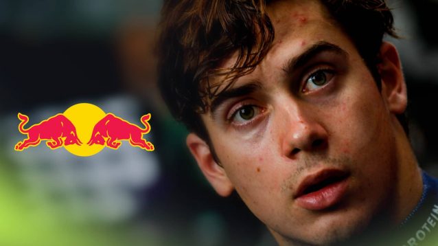 A close-up shot of Franco Colapinto with a prominent Red Bull logo alongside him