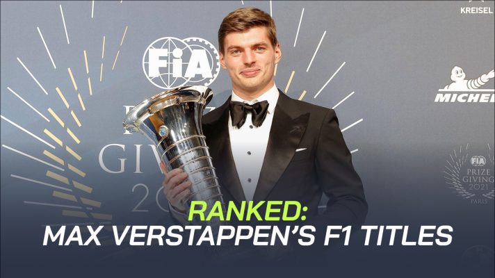 Max Verstappen with his F1 Drivers' Championship trophy
