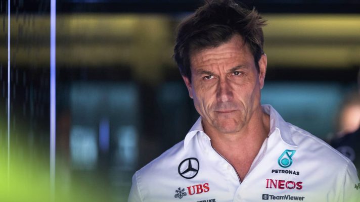 Toto Wolff looks glum as he makes his way through the Mercedes garage