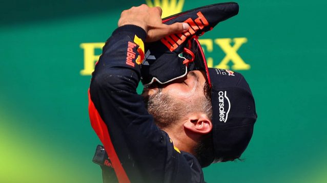 Daniel Ricciardo drinking from his own shoe