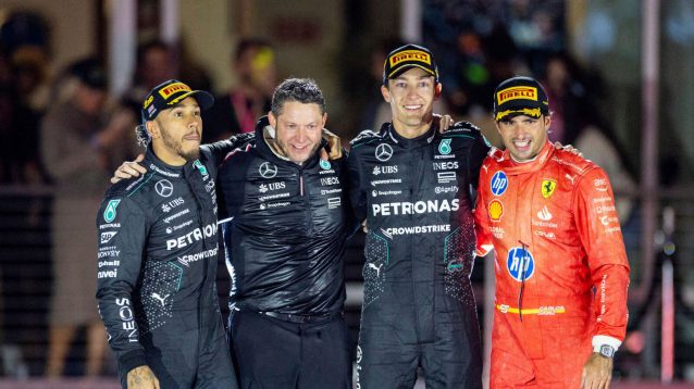 George Russell on the podium with Lewis Hamilton and Carlos Sainz in Las Vegas