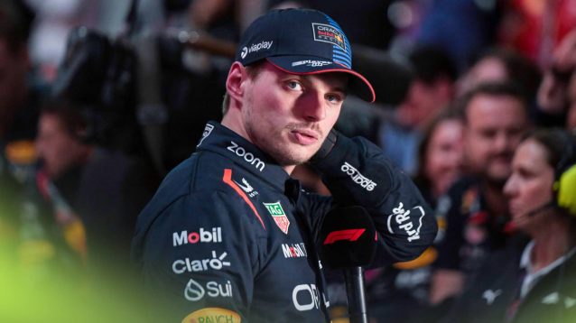 Max Verstappen glances directly at the camera during his post-race interview in Qatar