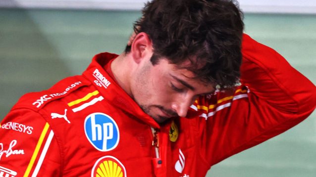 Charles Leclerc with his head down