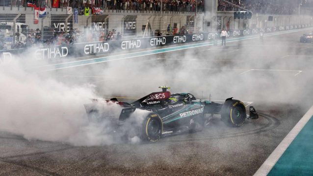 Lewis Hamilton completes donuts after his last race with Mercedes.