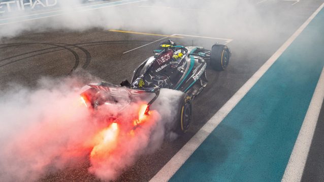 Lewis Hamilton tyre smoke as he does donuts