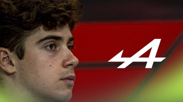 A side-profile shot of Franco Colapinto with a prominent Alpine logo alongside him