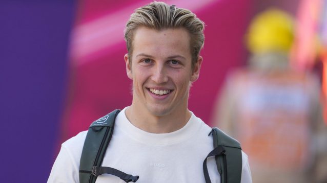 Liam Lawson all-smiles in the F1 paddock at the 2024 Qatar Grand Prix