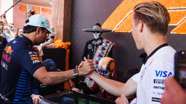 Sergio Perez and Liam Lawson shake hands at the 2024 Mexican Grand Prix