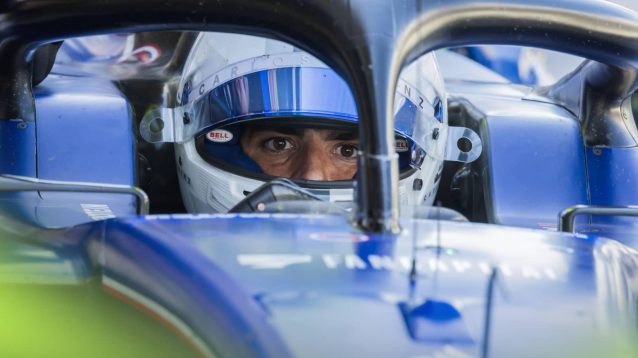 Carlos Sainz eyes are visible through the open visor of his helmet while testing for Williams in Abu Dhabi