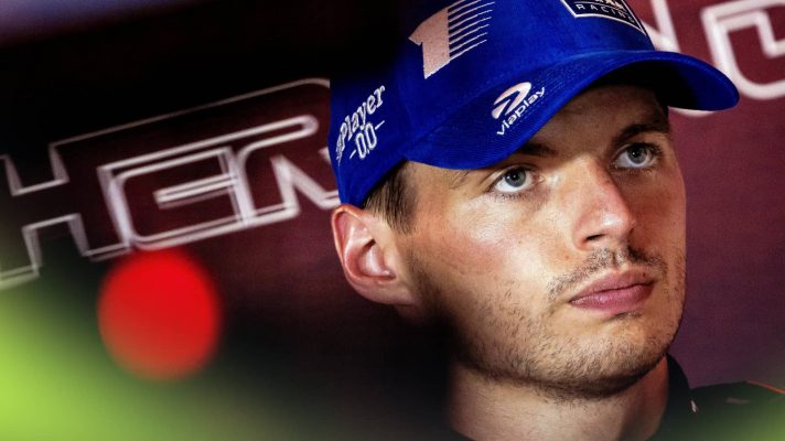 Max Verstappen looks annoyed in a press conference