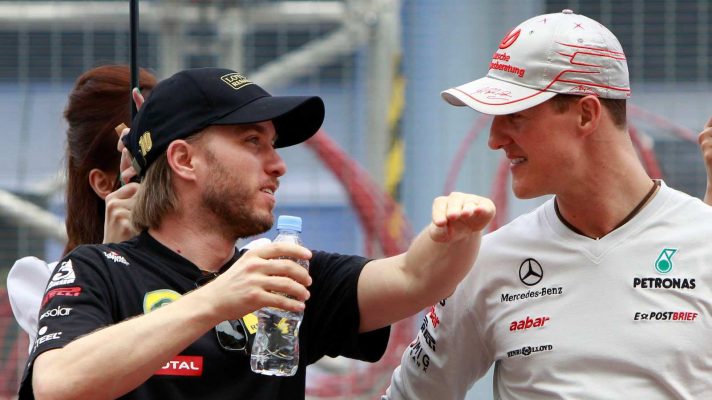 Nick Heidfeld Michael Schumacher Formula 1 2011 PlanetF1