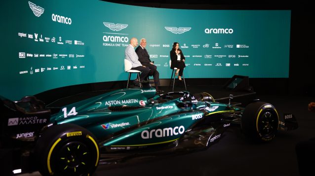 Adrian Newey and Lawrence Stroll, Owner, Aston Martin F1 Team, on stage with Laura Winter