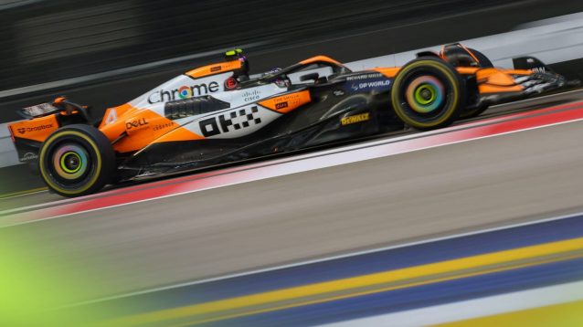 Lando Norris on track with the McLaren MCL38 running a one-off white livery at Singapore 2024