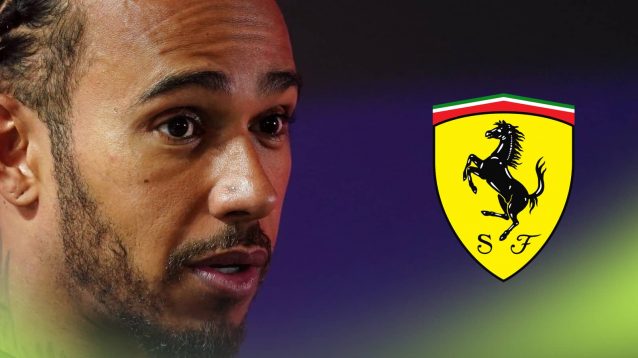 Lewis Hamilton looks alarmed with a prominent Ferrari logo alongside him