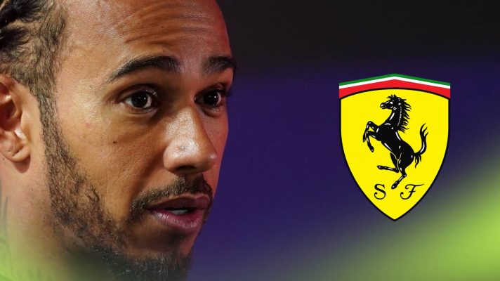 Lewis Hamilton looks alarmed with a prominent Ferrari logo alongside him