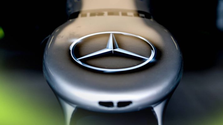 A close-up shot of a Mercedes F1 nose with the three-pointed star logo clearly visible