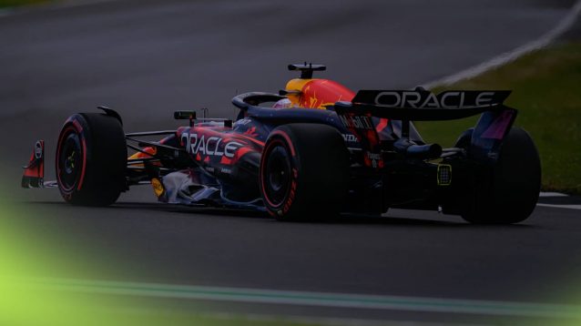 Max Verstappen in action in gloomy conditions at Silverstone in 2024