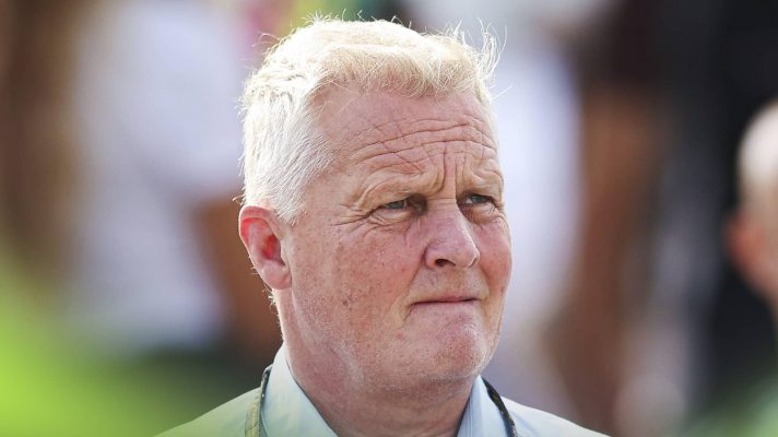 Johnny Herbert looks concerned as he bites his lip