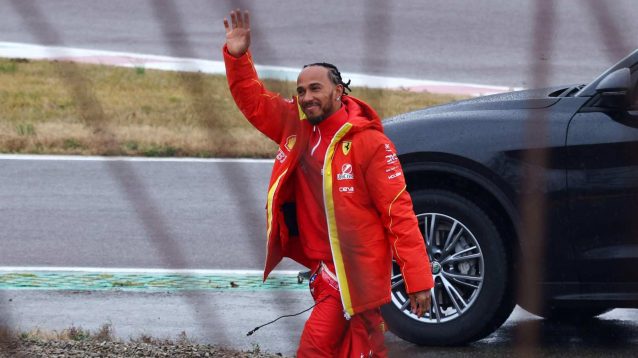 Lewis Hamilton waves to Ferrari fans at Fiorano.