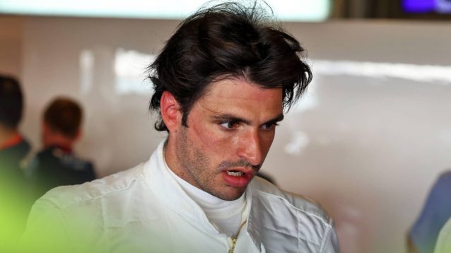 Carlos Sainz looks on in the Williams garage