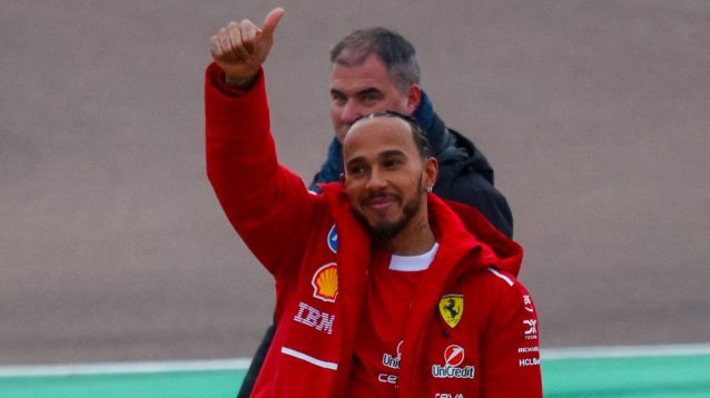 Lewis Hamilton salutes the crowd at Fiorano.