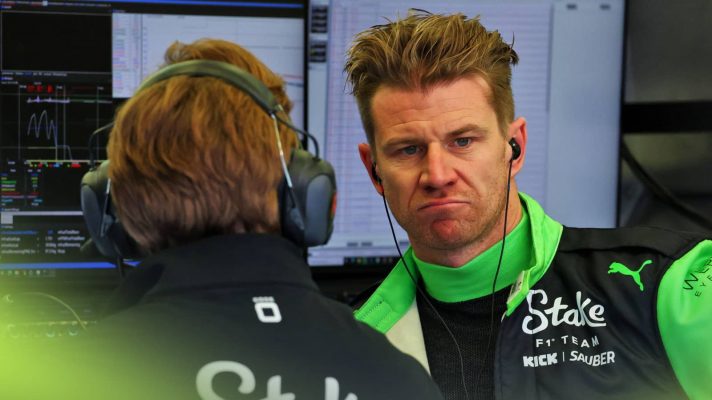 Nico Hulkenberg looks unimpressed in the Sauber garage