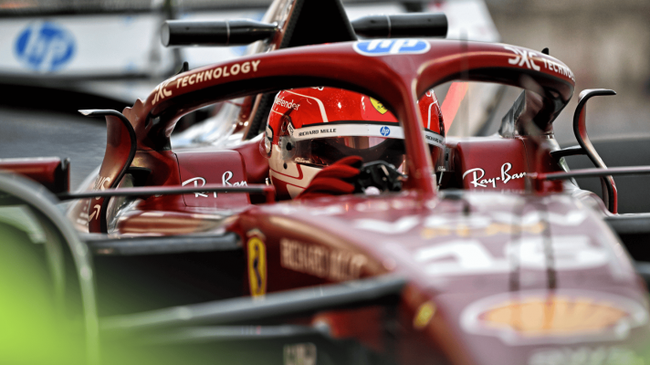 A close up shot of Charles Leclerc at work on track with the Ferrari SF-25
