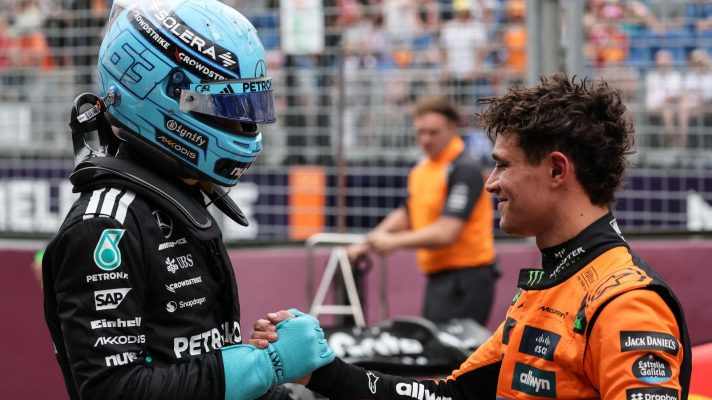 George Russell shakes Lando Norris' hand