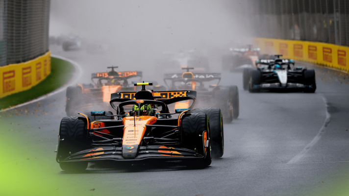 Lando Norris's McLaren MCL39 leads the F1 field at the start of the wet Australian Grand Prix