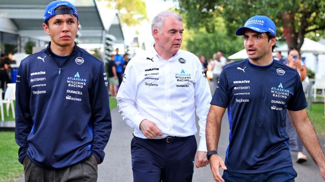 Alex Albon and Carlos Sainz of Williams talking to team manager Dave Redding at the 2025 Australian Grand Prix