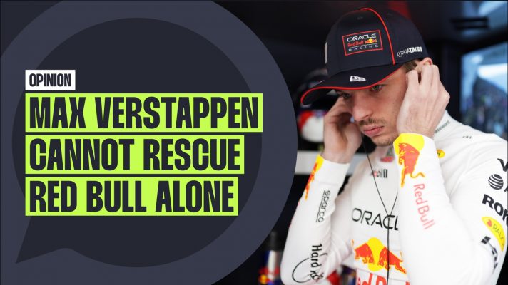 Max Verstappen with his fingers in his ears.