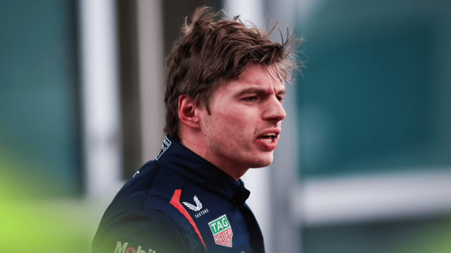 Max Verstappen looks anguished as he speaks in parc ferme after the Chinese Grand Prix