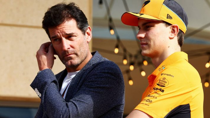 McLaren's Oscar Piastri and manager Mark Webber, pictured in 2024.