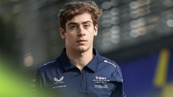Franco Colapinto makes his way through the paddock at the Australian GP