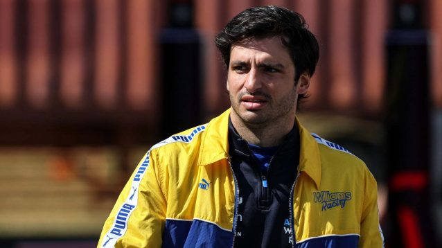 Williams driver Carlos Sainz arrives at Suzuka.
