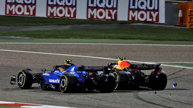 Carlos Sainz and Yuki Tsunoda during the race in Bahrain.