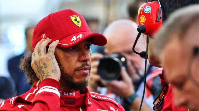 Lewis Hamilton speaks with his Ferrari crew ahead of the 2025 Bahrain Grand Prix