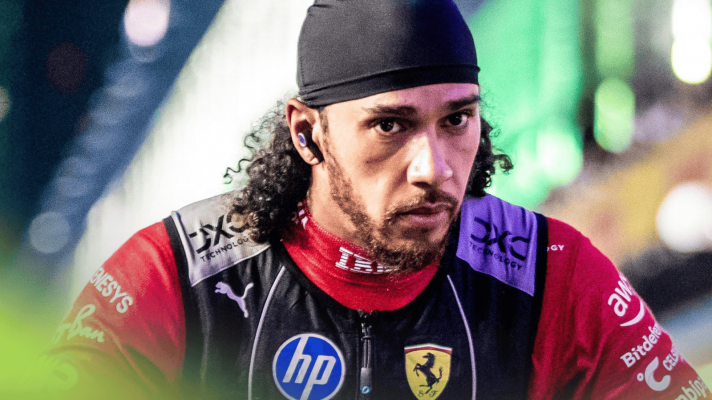 Lewis Hamilton looks tense as he makes his way down the pit lane before the start in Saudi Arabia