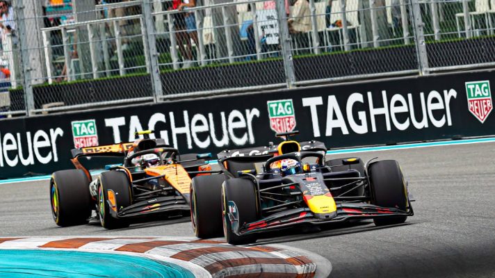 Red Bull's Max Verstappen and McLaren's Lando Norris battle in the 2025 Miami Grand Prix.