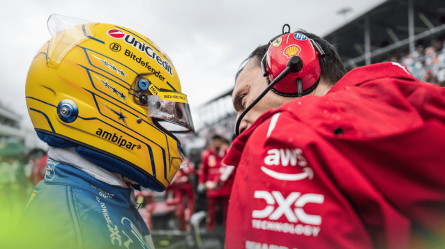 Lewis Hamilton and race engineer Riccardo Adami in conversation on the grid in Miami
