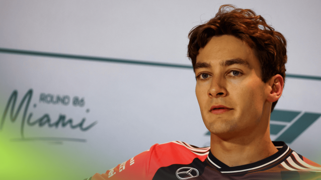 George Russell looks on during a press conference in Miami